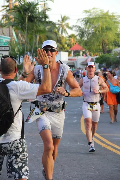 Pete McLean high-fiving Kristian in Kona