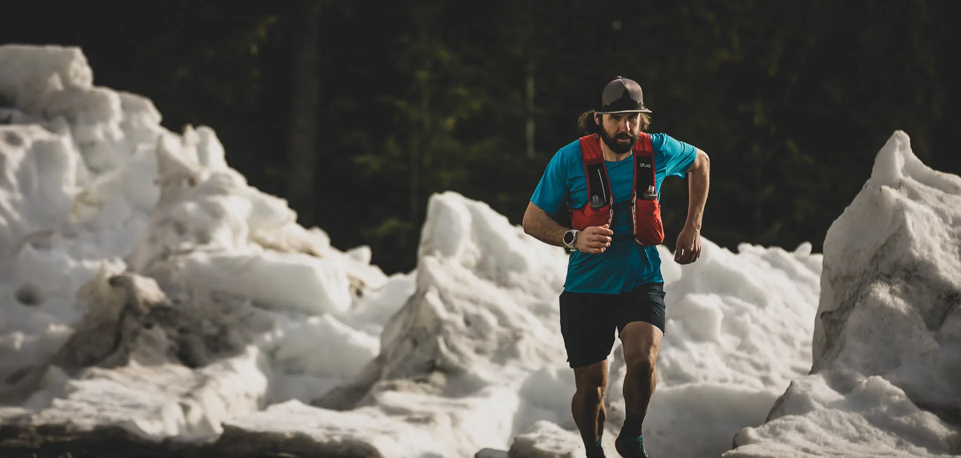 Kristian Manietta running in the mountains